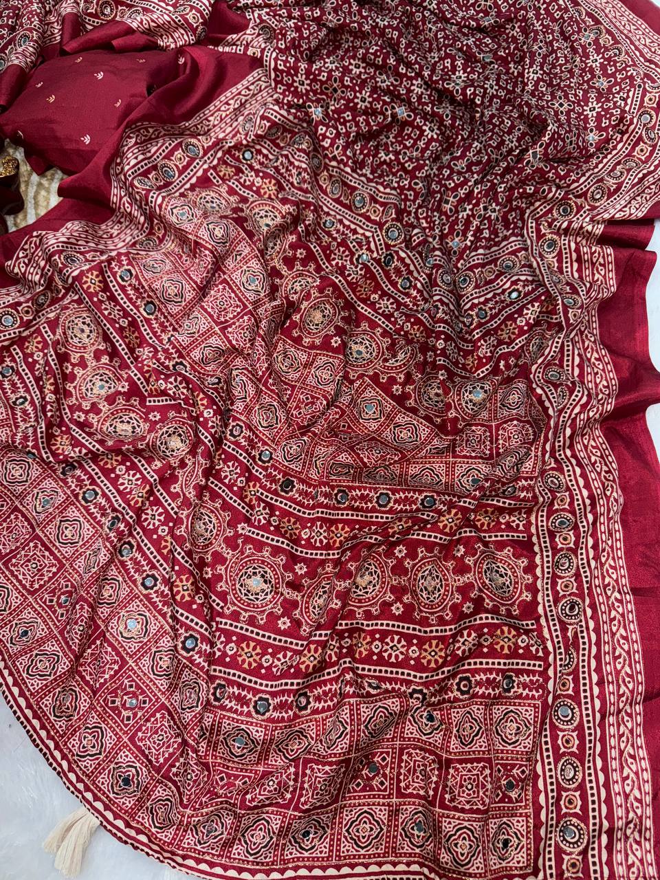 Heritage Ajrakh-Inspired Printed Saree with Mirror Work Detailing & Tassel Accents