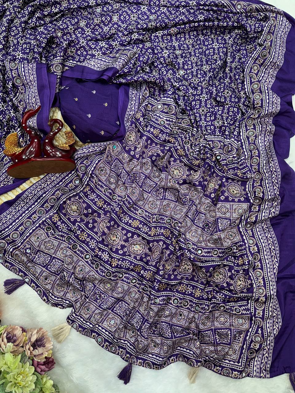 Heritage Ajrakh-Inspired Printed Saree with Mirror Work Detailing & Tassel Accents