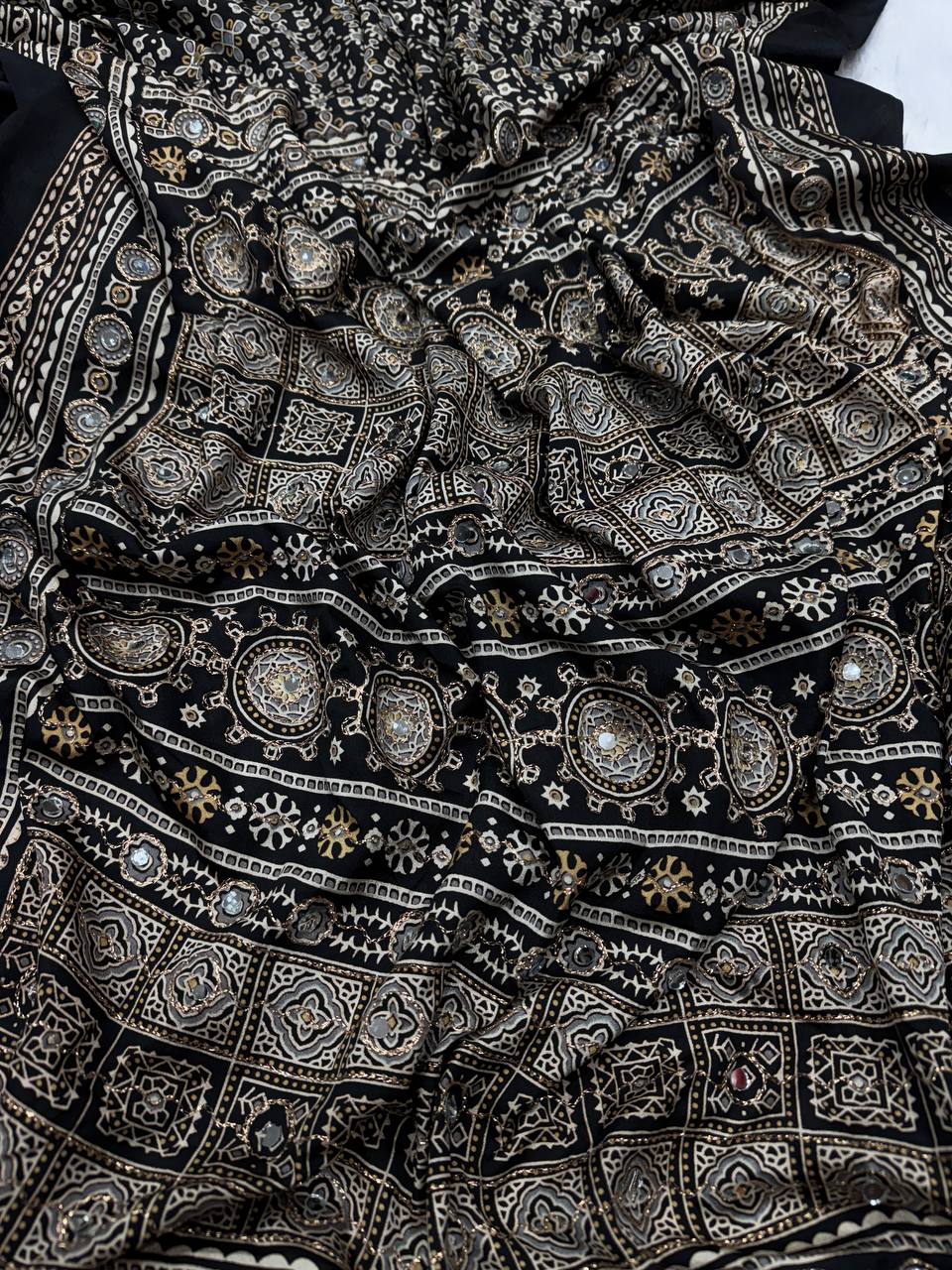 Heritage Ajrakh-Inspired Printed Saree with Mirror Work Detailing & Tassel Accents