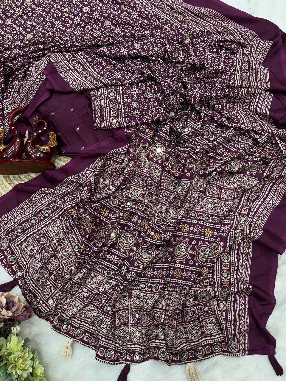 Heritage Ajrakh-Inspired Printed Saree with Mirror Work Detailing & Tassel Accents