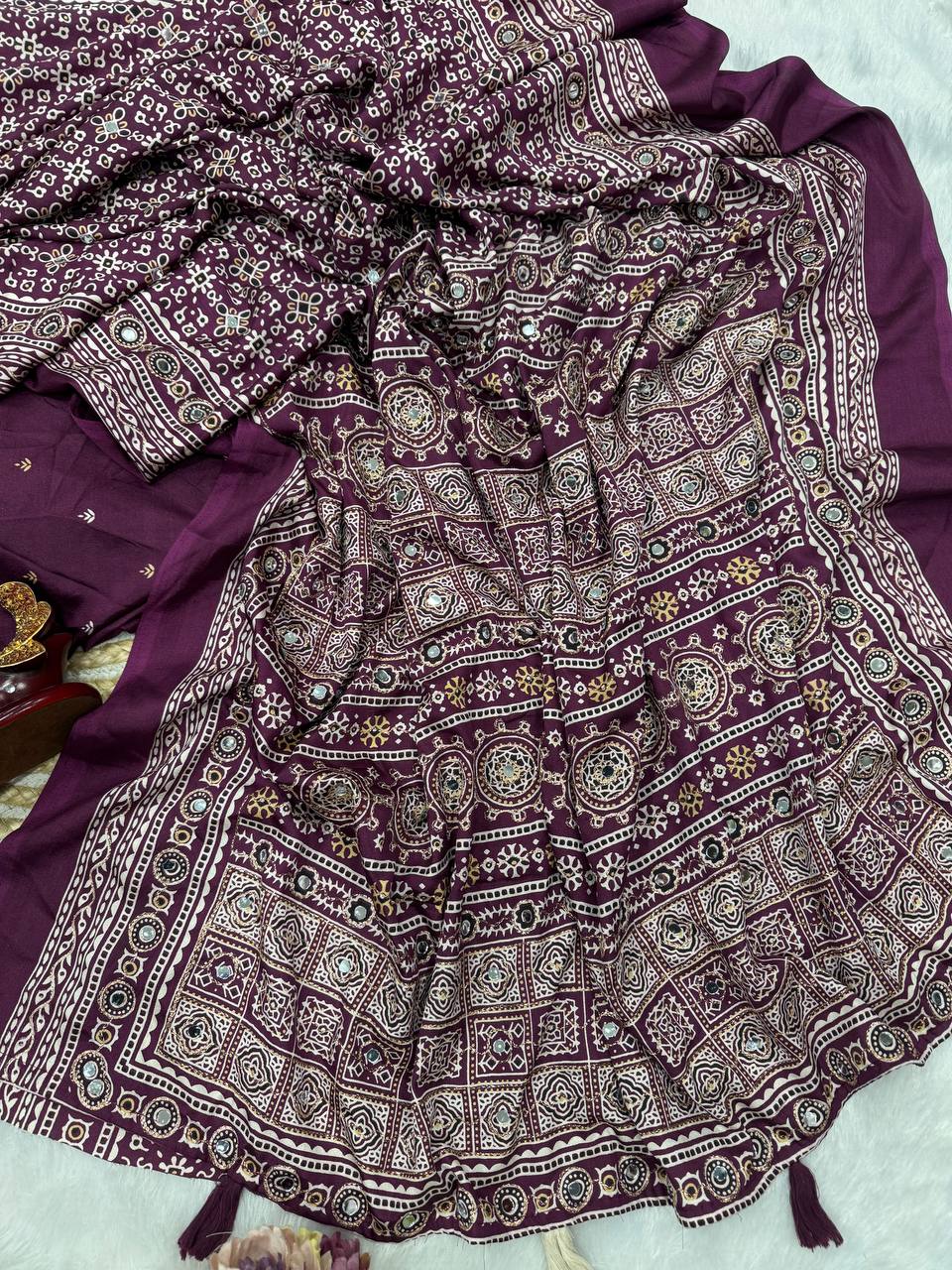 Heritage Ajrakh-Inspired Printed Saree with Mirror Work Detailing & Tassel Accents