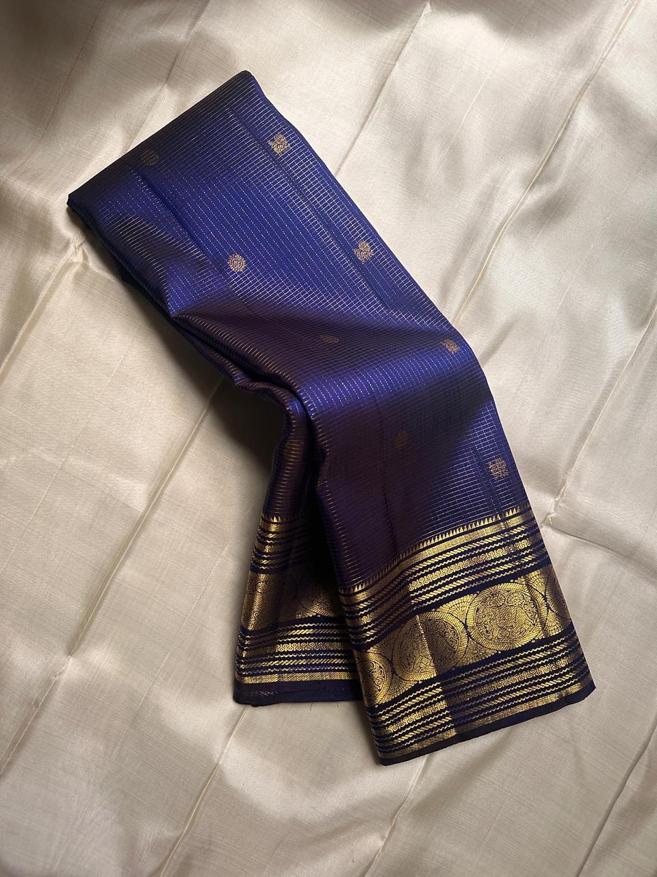 Royal Indigo Blue Silk Saree with Antique Gold Zari Temple Border & Elegant Grid Weaving