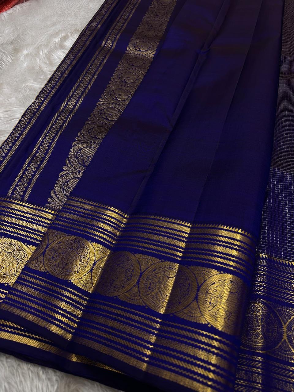 Royal Indigo Blue Silk Saree with Antique Gold Zari Temple Border & Elegant Grid Weaving