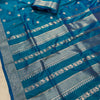 Royal Teal Blue Banarasi Silk Saree with Antique Silver Zari Floral Buttas & Traditional Heritage Border