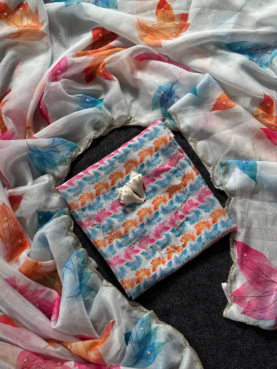 Ivory Whisper Organza Saree with Multicolor Leaf Motifs & Pearl Finish Border