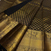 Royal Black Banarasi Silk Saree with All-Over Gold Zari Butti & Grand Peacock Border | Premium Wedding & Festive Wear