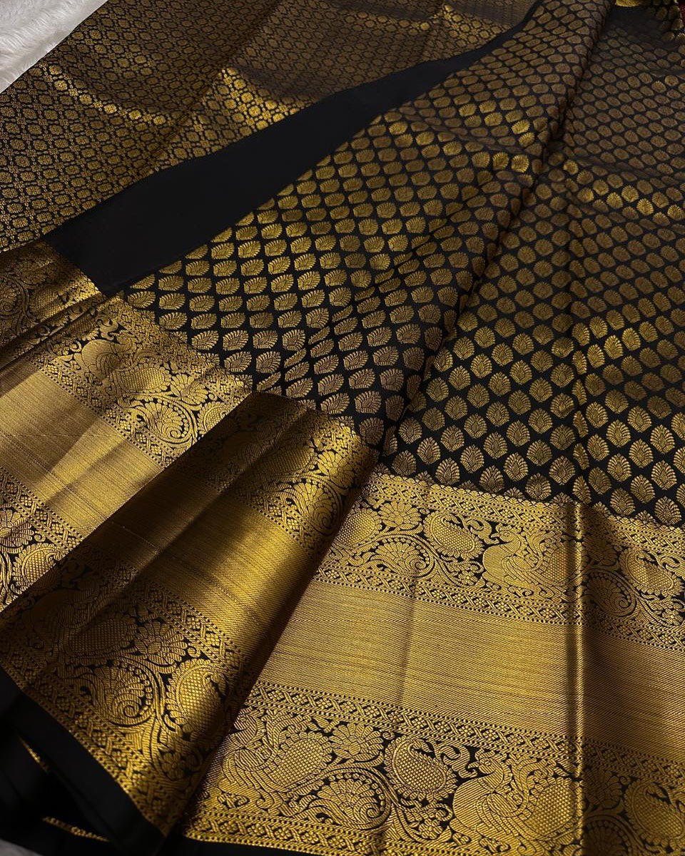 Royal Black Banarasi Silk Saree with All-Over Gold Zari Butti & Grand Peacock Border | Premium Wedding & Festive Wear