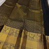Royal Black Banarasi Silk Saree with All-Over Gold Zari Butti & Grand Peacock Border | Premium Wedding & Festive Wear