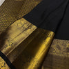 Royal Black Banarasi Silk Saree with All-Over Gold Zari Butti & Grand Peacock Border | Premium Wedding & Festive Wear