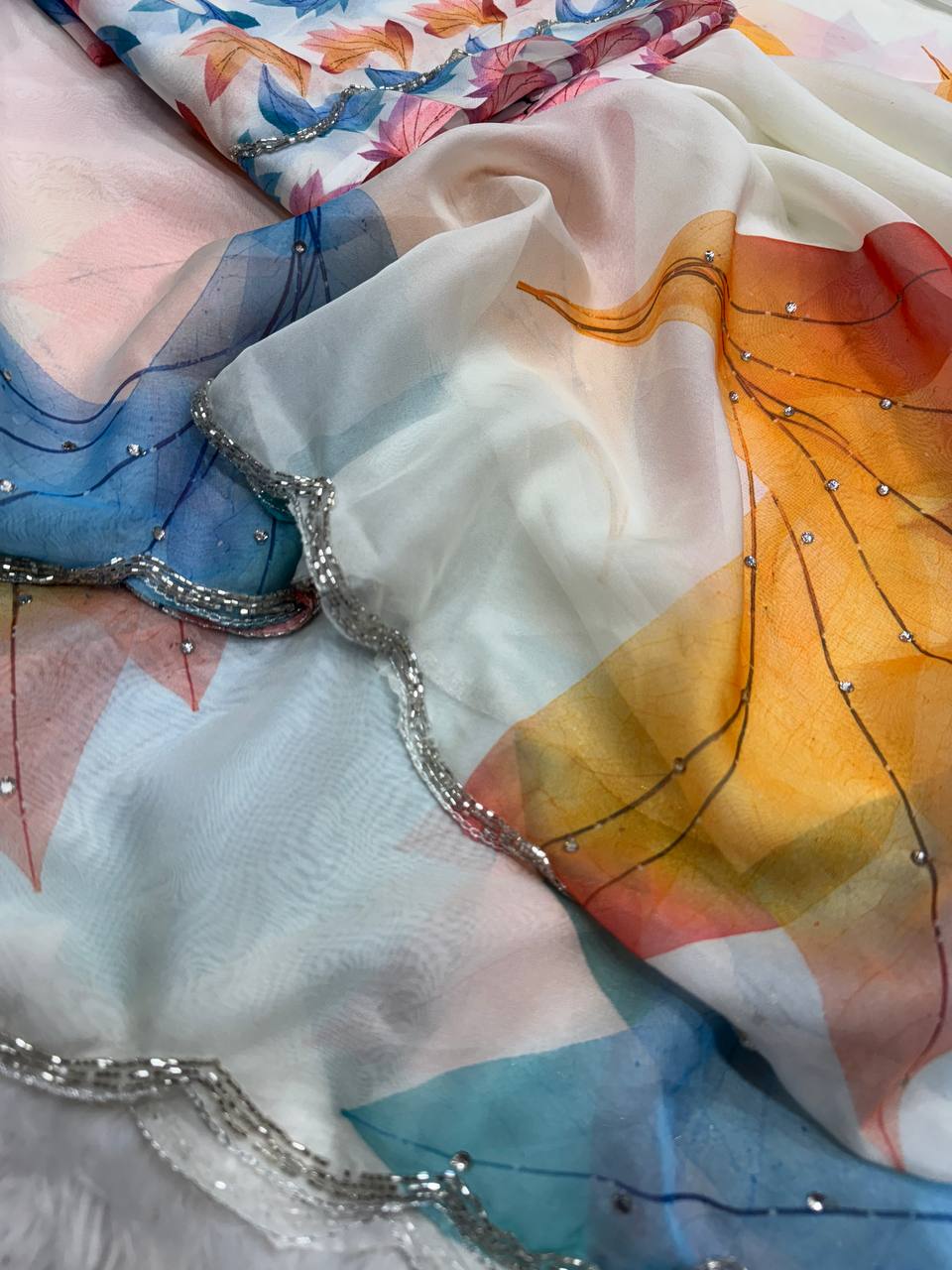 Premium White Soft Georgette Saree With Multicolor Leaf Print & Stone Work Fancy Saree