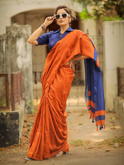 Rust Orange Linen Saree with Navy Blue Contrast Pallu & Tassels | Modern Minimal Everyday Wear
