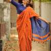 Rust Orange Linen Saree with Navy Blue Contrast Pallu & Tassels | Modern Minimal Everyday Wear