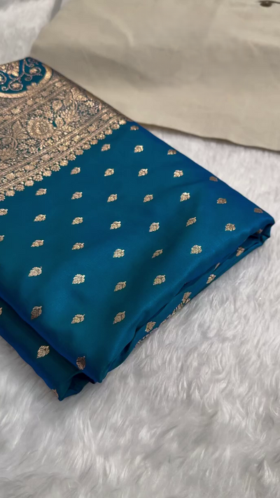 Teal Blue Banarasi Silk Saree – Golden Zari Butta & Rich Floral Border