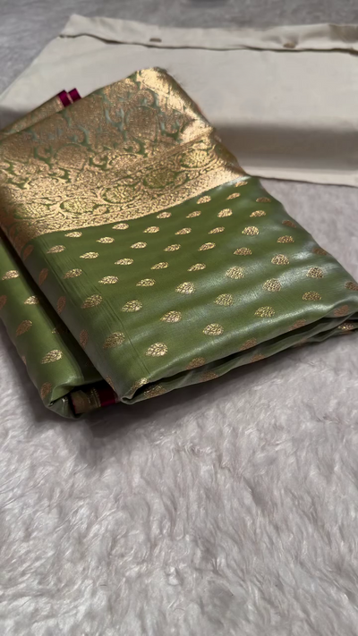Sage Green Banarasi Silk Saree – Golden Zari Butta & Grand Heritage Border