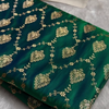 Emerald Green Banarasi Silk Saree – All-Over Zari Jaal & Leaf Motif Weave
