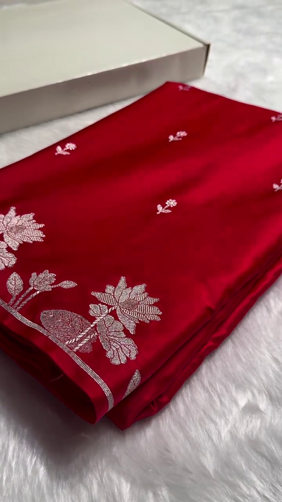 Ruby Red Banarasi Silk Saree – Silver Zari Floral Border & Minimal Butta Work