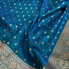 Teal Blue Banarasi Silk Saree – Golden Zari Butta & Rich Floral Border