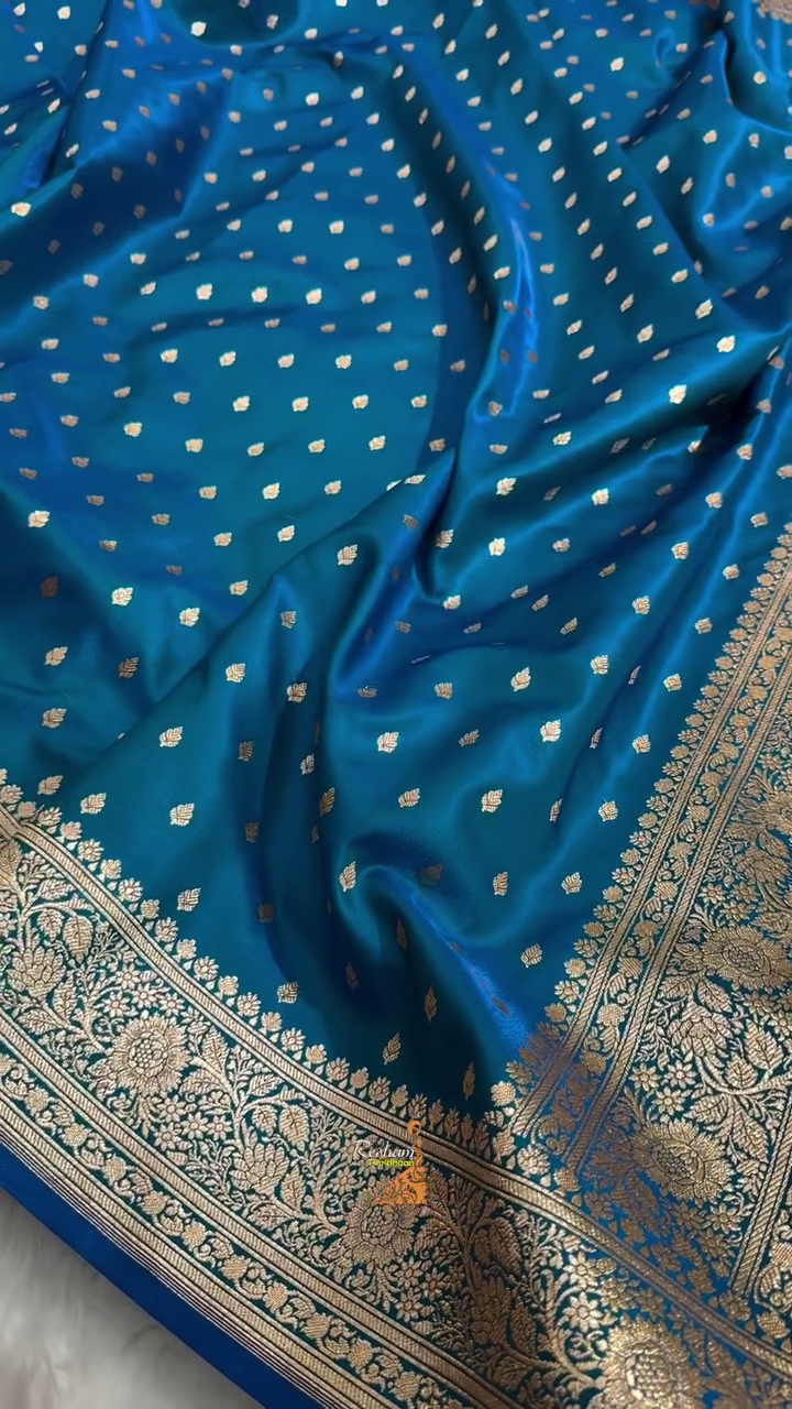 Teal Blue Banarasi Silk Saree – Golden Zari Butta & Rich Floral Border