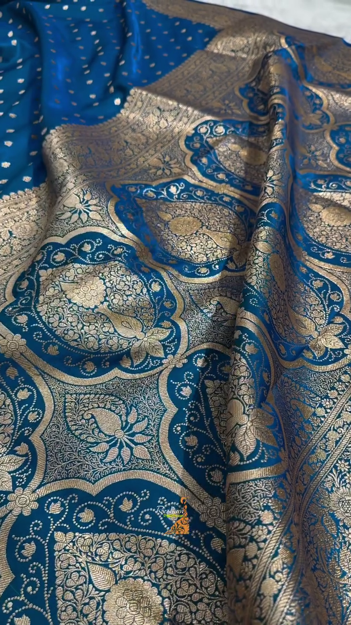 Teal Blue Banarasi Silk Saree – Golden Zari Butta & Rich Floral Border
