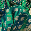 Emerald Green Banarasi Silk Saree – All-Over Zari Jaal & Leaf Motif Weave