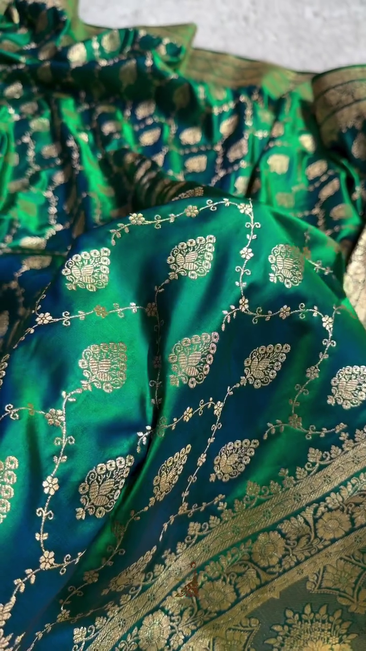 Emerald Green Banarasi Silk Saree – All-Over Zari Jaal & Leaf Motif Weave