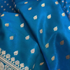 Teal Blue Banarasi Silk Saree – Golden Zari Butta & Rich Floral Border
