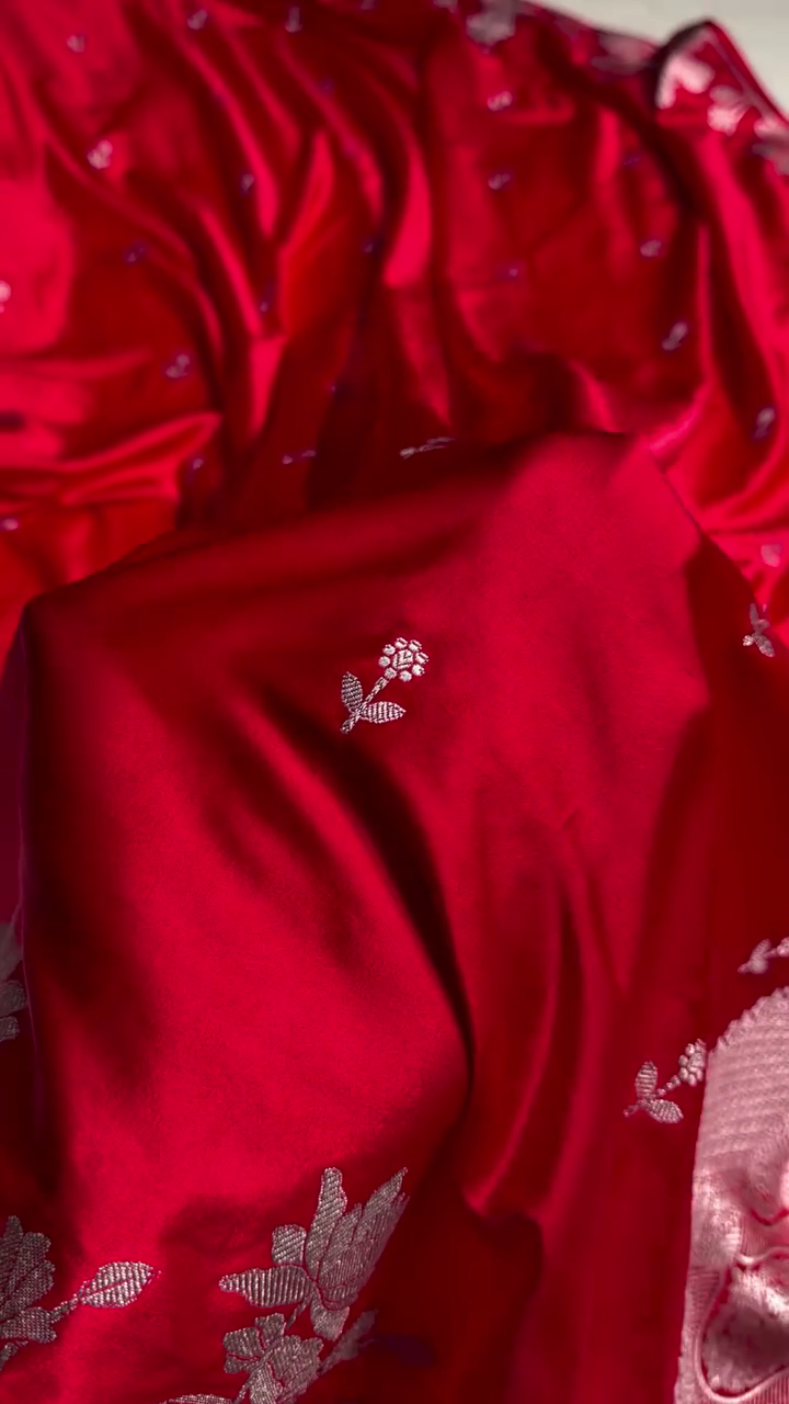 Ruby Red Banarasi Silk Saree – Silver Zari Floral Border & Minimal Butta Work