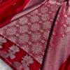 Ruby Red Banarasi Silk Saree – Silver Zari Floral Border & Minimal Butta Work