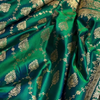 Emerald Green Banarasi Silk Saree – All-Over Zari Jaal & Leaf Motif Weave
