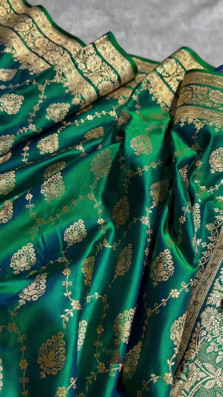 Emerald Green Banarasi Silk Saree – All-Over Zari Jaal & Leaf Motif Weave