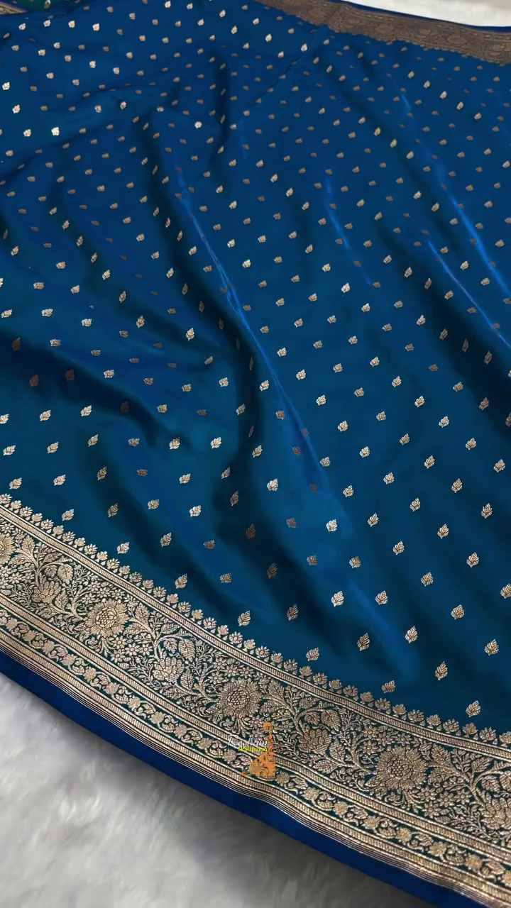Teal Blue Banarasi Silk Saree – Golden Zari Butta & Rich Floral Border