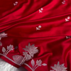 Ruby Red Banarasi Silk Saree – Silver Zari Floral Border & Minimal Butta Work