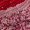 Ruby Red Banarasi Silk Saree – Silver Zari Floral Border & Minimal Butta Work